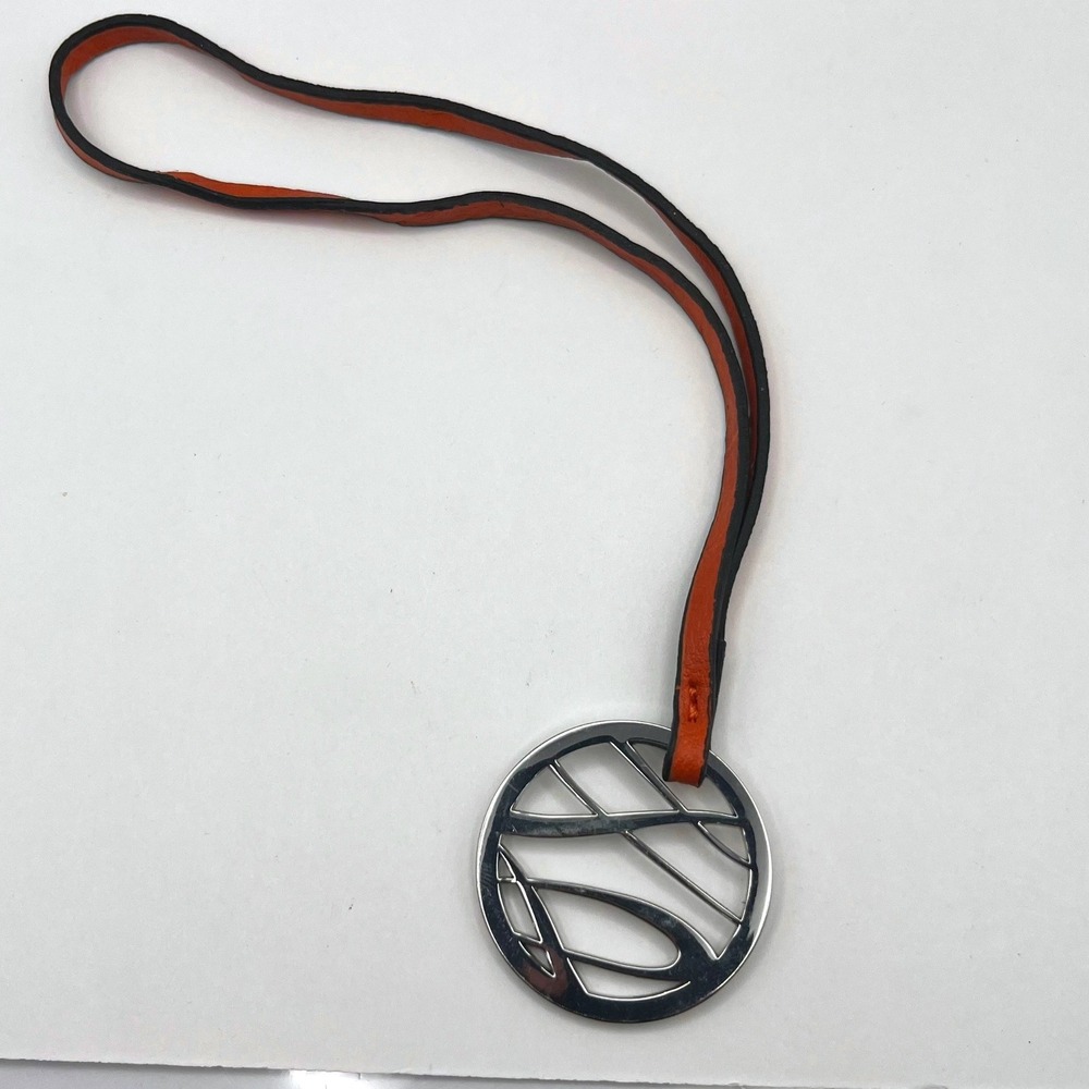 Vintage Silver Tone Cutout‎ Abstract Circle Pendant Necklace Orange Leather Cord